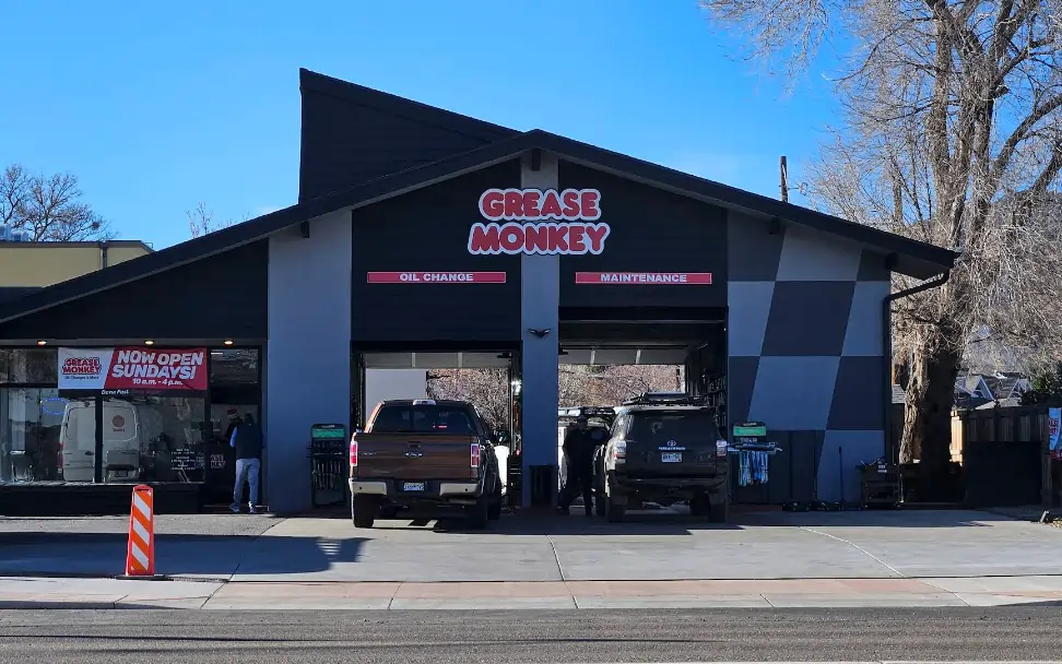 Cars bring serviced at Grease Monkey in Boulder, Colorado