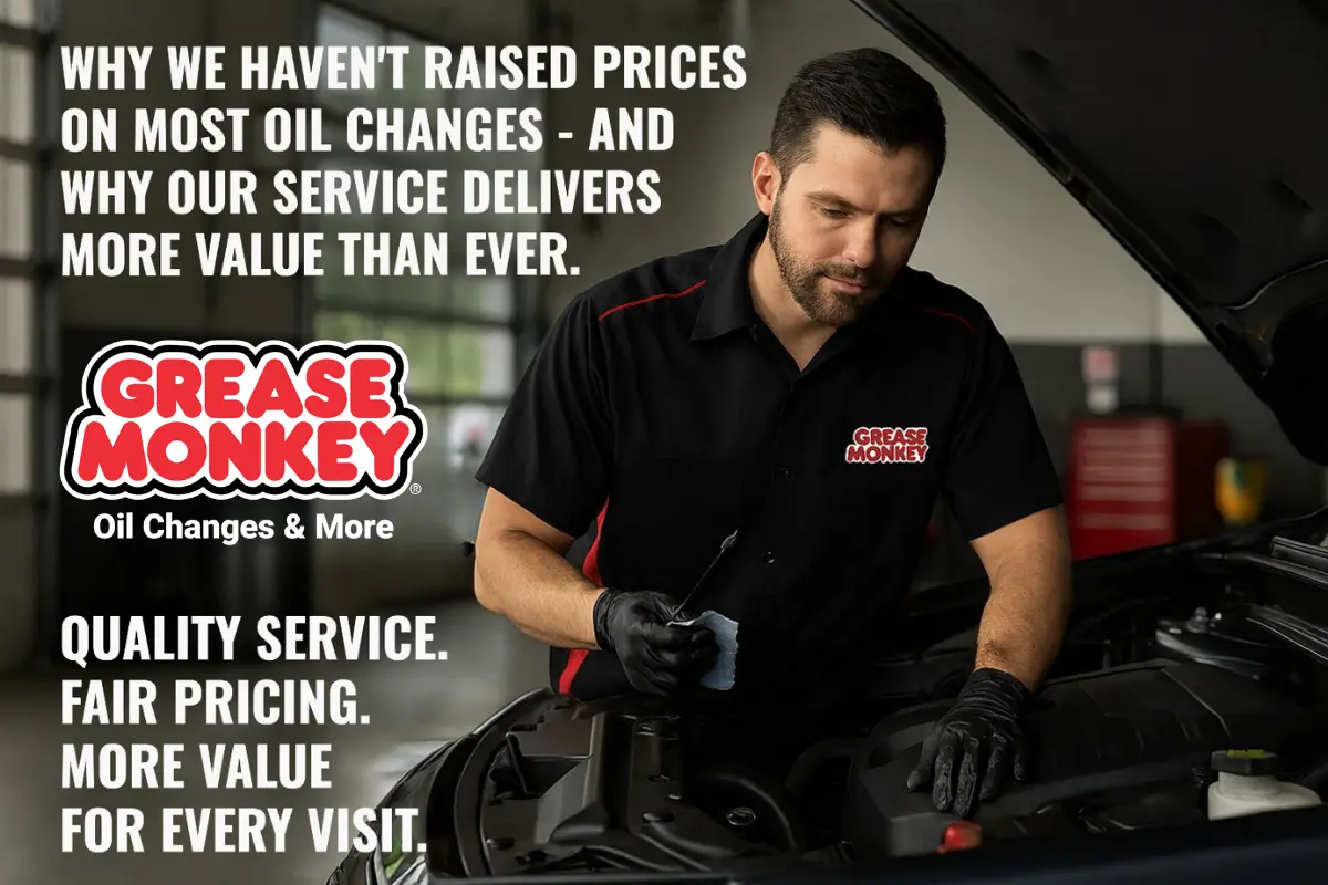 Grease Monkey technician performing Full Service Oil Changes